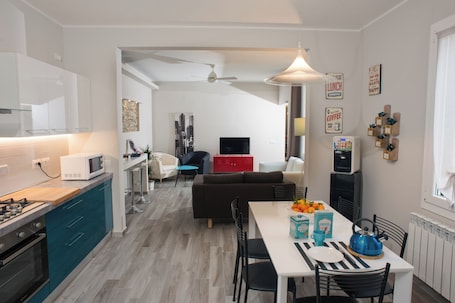 Apartment | Living area | 24-inch flat-screen TV with digital channels