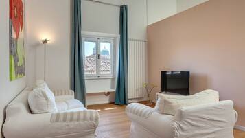 Apartment | Living area | 40-inch flat-screen TV with digital channels