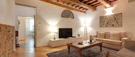 Apartment | Living area | 24-inch flat-screen TV with digital channels
