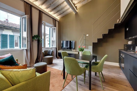 Apartment | Living area | 24-inch flat-screen TV with digital channels