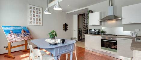 Apartment | Living area | 24-inch flat-screen TV with digital channels