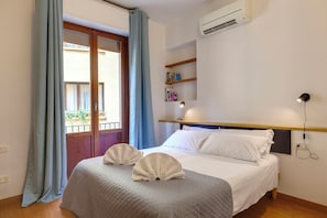 Appartamento | Postazione laptop, ferro/asse da stiro, Wi-Fi gratuito, lenzuola