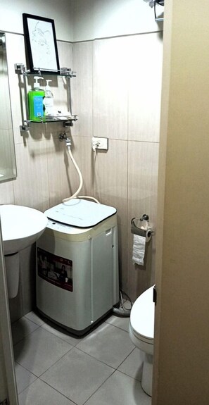 Shower, bidet, towels, soap