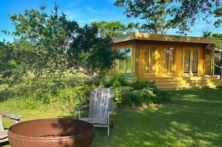 Property grounds. Tranquil Modern Farm Cabin