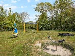 Bungalow | Garden - Bungalow in Sint Maartenszee Near Sandy Beach (Sint Maartensvlotbrug)