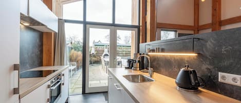 Villa | Private kitchen | Stovetop, electric kettle, toaster