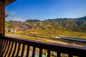 Unclassified image, 5 of 44, button - Xijiang miao village listen to tao xuan hotel (Leishan)