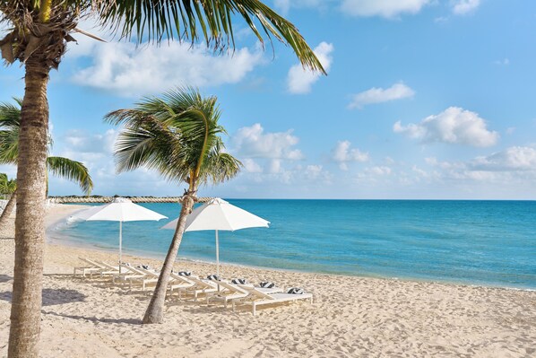 Private beach, free beach cabanas, sun loungers, beach umbrellas