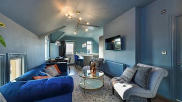 Apartment, 1 Bedroom | Living area | Flat-screen TV