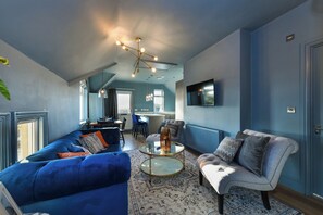 Apartment, 1 Bedroom | Living area | Flat-screen TV