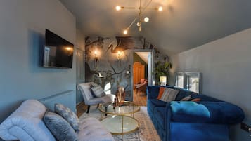 Apartment, 1 Bedroom | Living area | Flat-screen TV