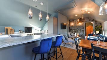 Apartment, 1 Bedroom | Living area | Flat-screen TV