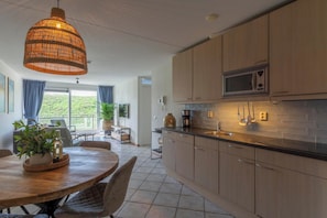Apartment | Private kitchen | Electric kettle, toaster, highchair - Wijde Blick 310 Apartment Near Callanstoog Beach (Callantsoog)