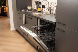 Microwave, dishwasher, dining tables