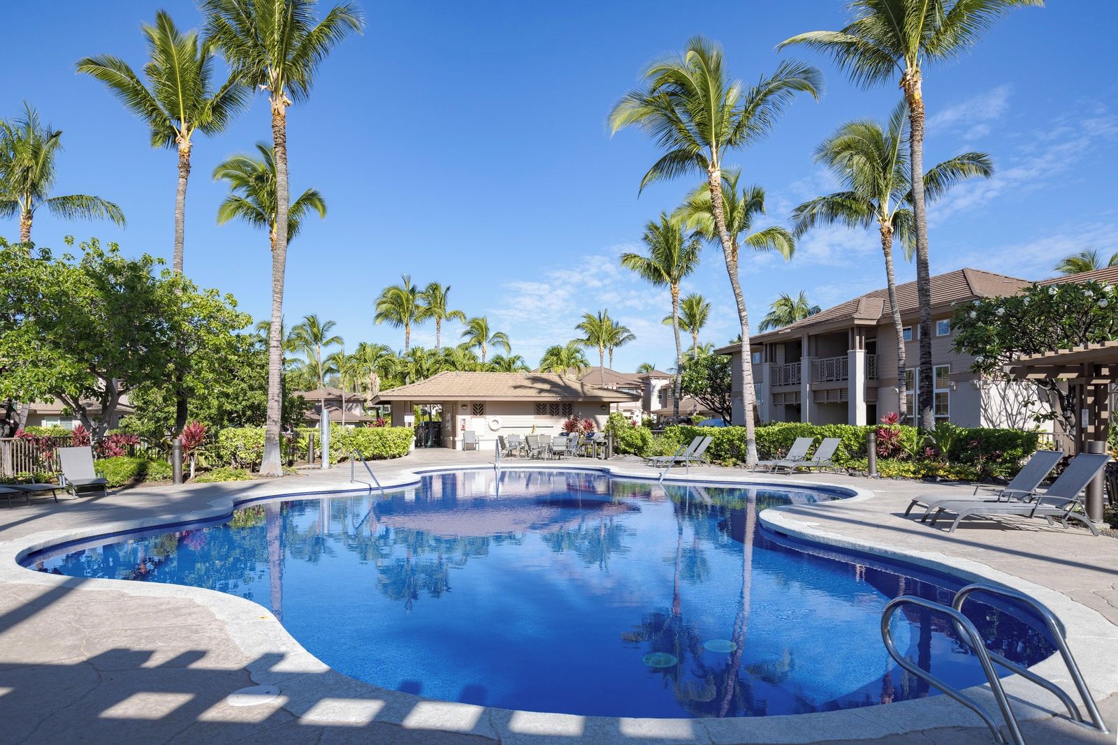 Dive into the sparkling pool surrounded by tropical gardens and peaceful water features. Colony Villas’ pool area is your personal island oasis.
