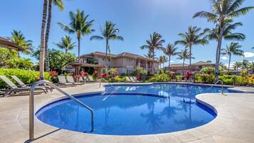 Lounge poolside with a tropical drink in hand and let the gentle breeze refresh you. The pool area here is designed for ultimate comfort.