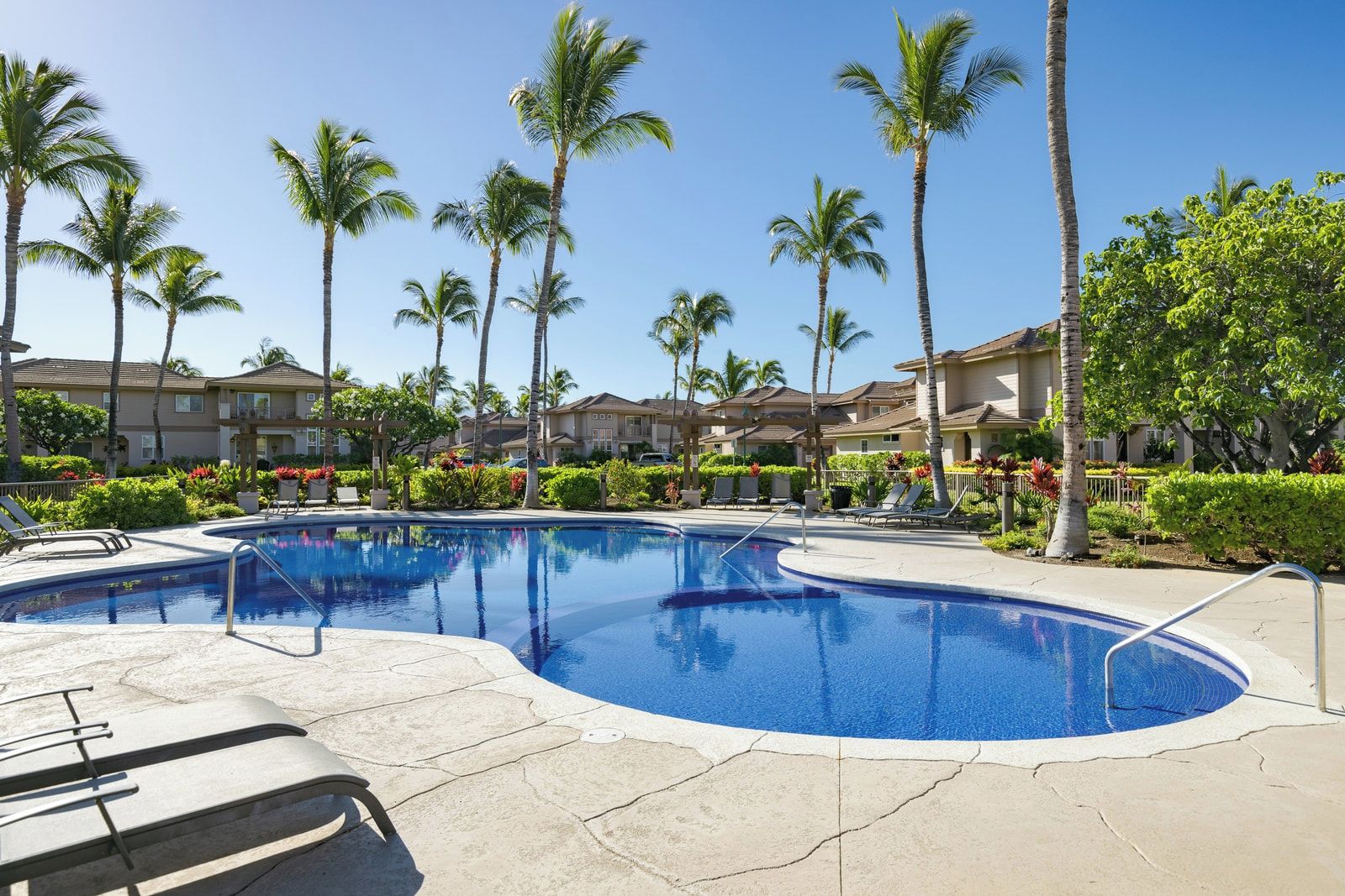 The pool’s pristine waters and tropical surroundings create a refreshing retreat. Enjoy peaceful moments or socialize with friends in this beautiful space.