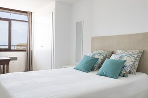 2 dormitorios, tabla de planchar con plancha, wifi y ropa de cama