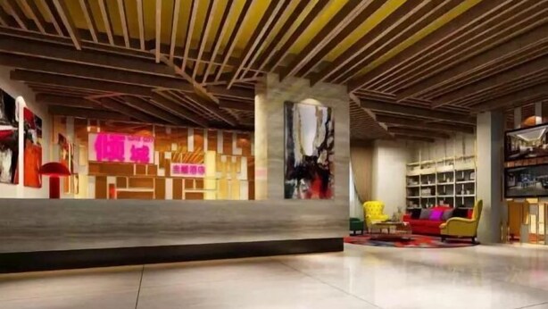 A spacious lobby with a modern wooden ceiling, a reception desk, and a seating area with colorful chairs. - Yueyang Qingcheng Theme Hotel (Yueyang County)