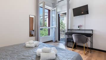 Deluxe Quadruple Room, Garden View | Soundproofing, iron/ironing board, free WiFi
