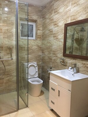 Comfort Room, Balcony, City View | Bathroom | Bathtub, slippers, towels, soap - De Palms Hotel Port Harcourt (Port Harcourt)