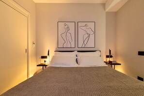 2 chambres, coffres-forts dans les chambres, fer et planche à repasser