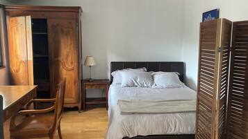 1 bedroom, desk, iron/ironing board, bed sheets