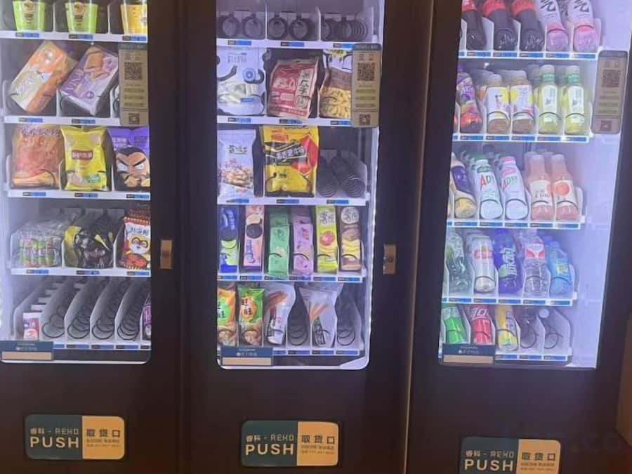A vending machine with various snacks and drinks.