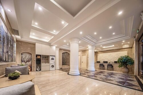 Xinyitian Hotel (Wenzhou Xueshan Road Wuma Street Branch)