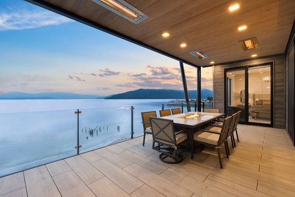 Your private balcony with seating for 10 and a fire element