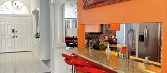 Updated luxury 4 Bed W/ KING Bed, FREE Heated Pool, Central Location