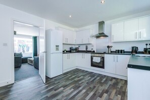 Fridge, microwave, oven, stovetop - Free Parking | 4 Bedroom House in St Helens (Warrington & St Helens)