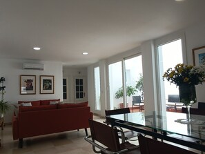 Superior Apartment, Courtyard View | Living area | TV