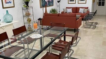 Superior Apartment, Courtyard View | Living area | TV