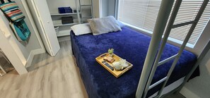 2 bedrooms, desk, iron/ironing board, travel crib