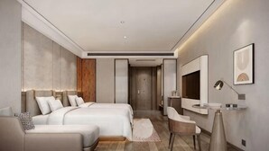 A modern hotel room with a large bed, a sofa, a desk, and a mirror. - Xiangtan Jinguiyuan Hotel (Government City Wanda Plaza) (Xiangtan)