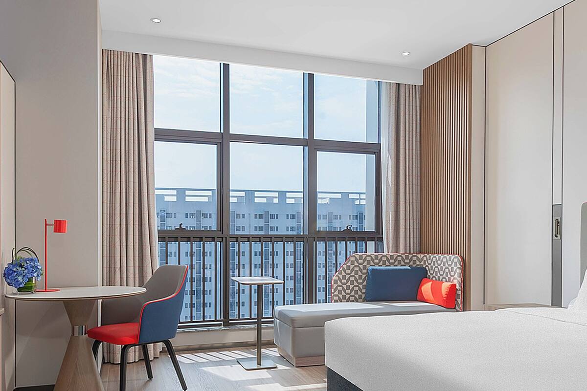 1 King Standard Extra Floor Space | 1 bedroom, down comforters, desk, blackout drapes