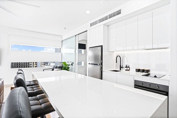 Fridge, microwave, oven, stovetop - 1007 Harbour- Luxury Harbour Lights Apartment | Marina Views | Pool & Gym (Cairns City)