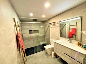 Hair dryer, towels, soap, shampoo