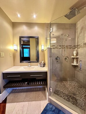 Shower, hair dryer, towels, soap