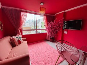 Apartment | Living area | Flat-screen TV -  O Apartamento Rosa (João Pessoa)