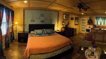 Suite estudio Deluxe, varias camas, cocineta, vista parcial al lago | 1 habitación, ropa de cama de alta calidad y camas con pillow-top