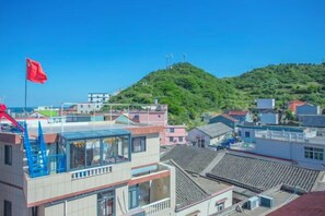 Unclassified image, 3 of 21, button - Shengsi medlar island juyuange fisherman's hostel (Shengsi)