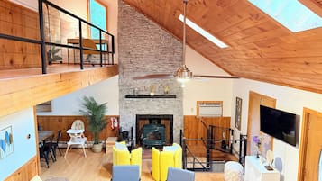 Smart TV, fireplace, books, offices