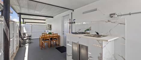 Fridge, microwave, stovetop, coffee/tea maker