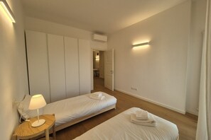 2 habitaciones, tabla de planchar con plancha, wifi y ropa de cama 