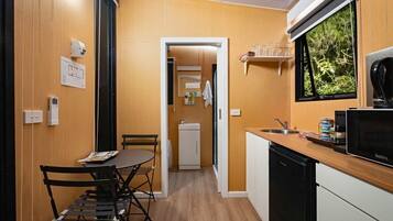 Fridge, microwave, stovetop, cookware/dishes/utensils