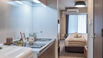 スタンダード 4 人部屋 バルコニー シティビュー | 防音設備、WiFi (無料)