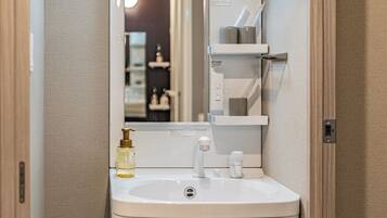 Standard Triple Room, Non Smoking, Balcony | Bathroom | Combined shower/tub, hair dryer, slippers, towels