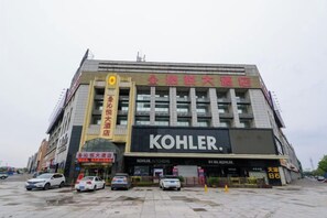 A multi-story building with a prominent sign for 'Kohler' and another sign for 'Kohler Kitchen.' - Qinyue Hotel Changzhou (Changzhou)